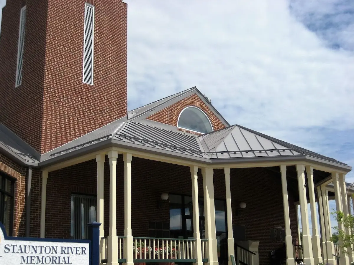 Skilled roofing craftsmen working on a residential roof in Martinsburg